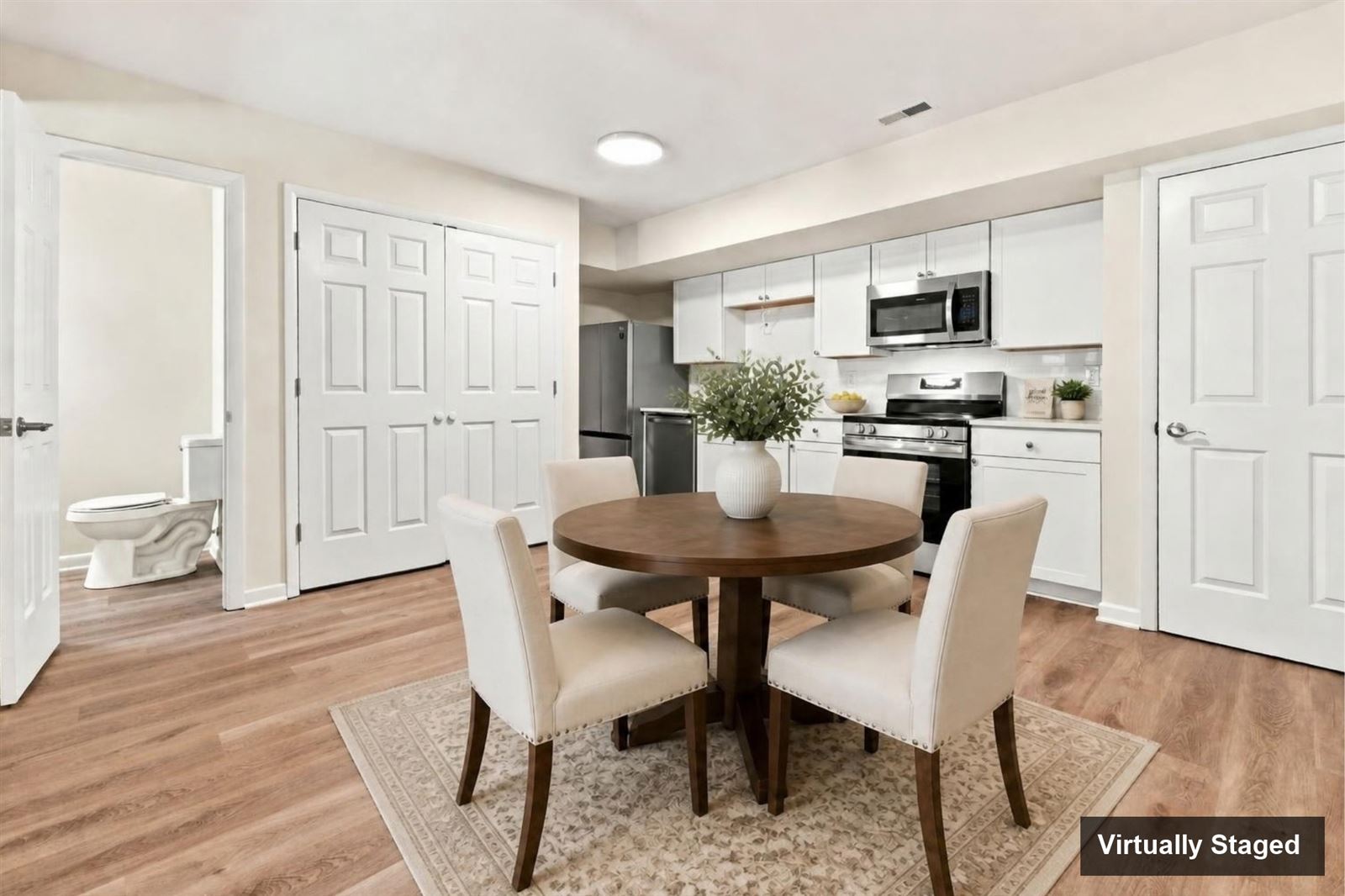 Kitchen and dining area, virtually staged