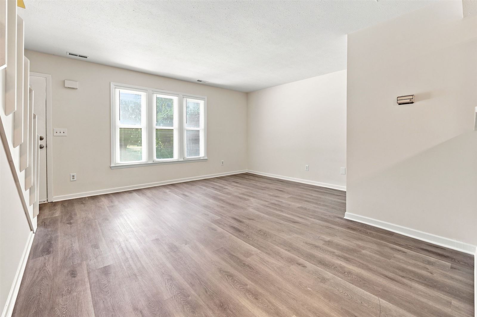 Living room with front windows and entry