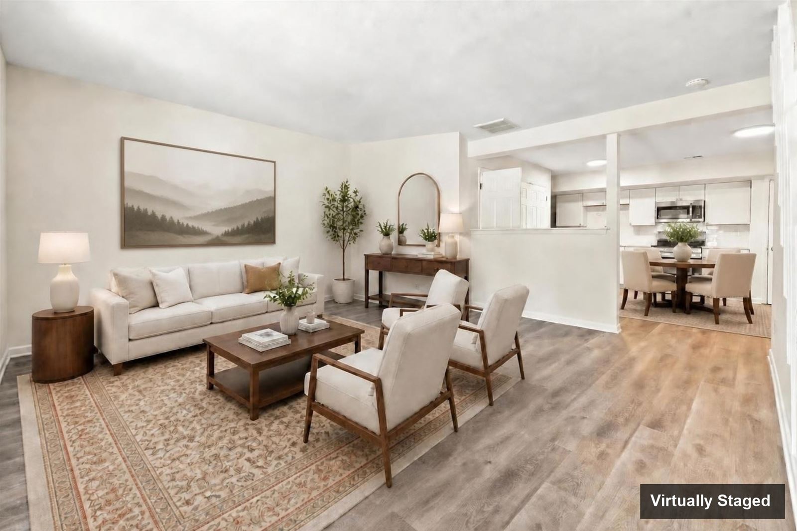 Living room open to the dining area, virtually staged