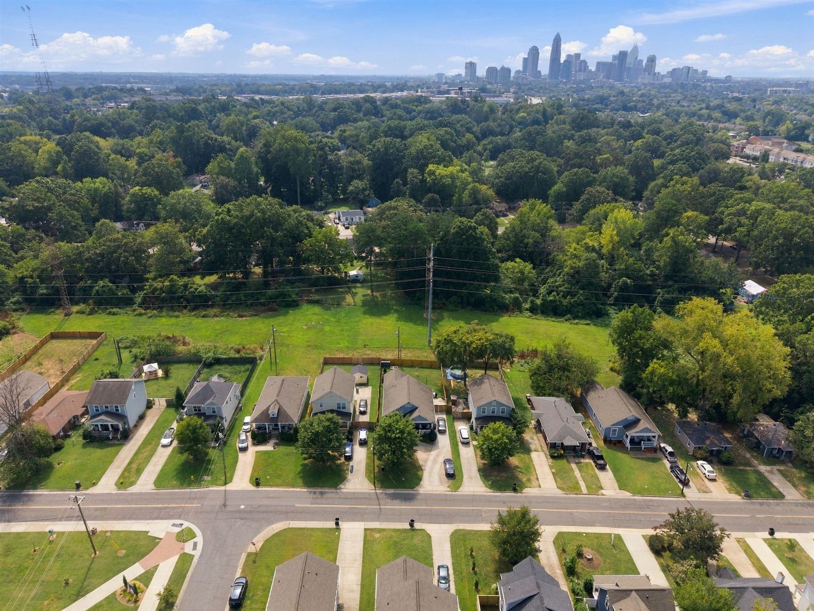 Norris Ave from above with the Uptown Charlotte skyline