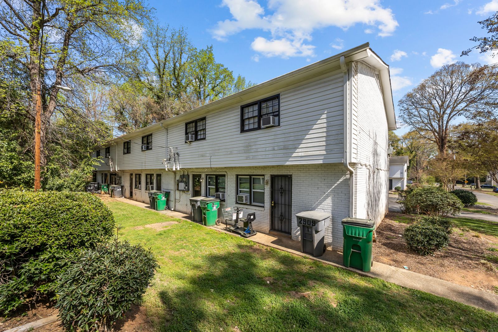 Building side, yard and landscaping