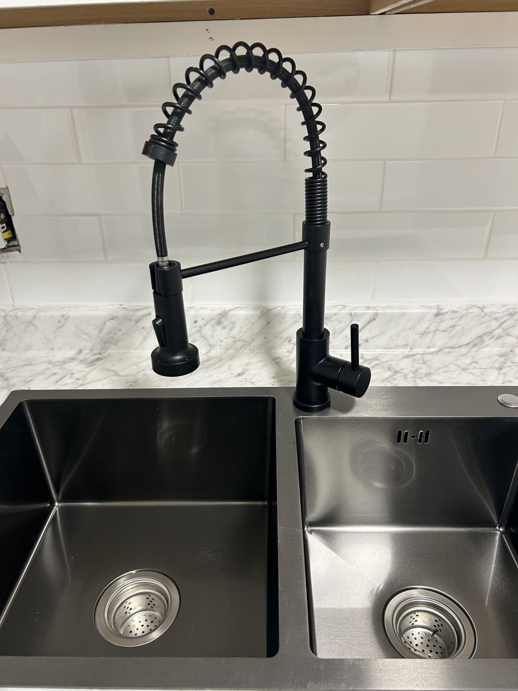 Double sink with pull-down faucet