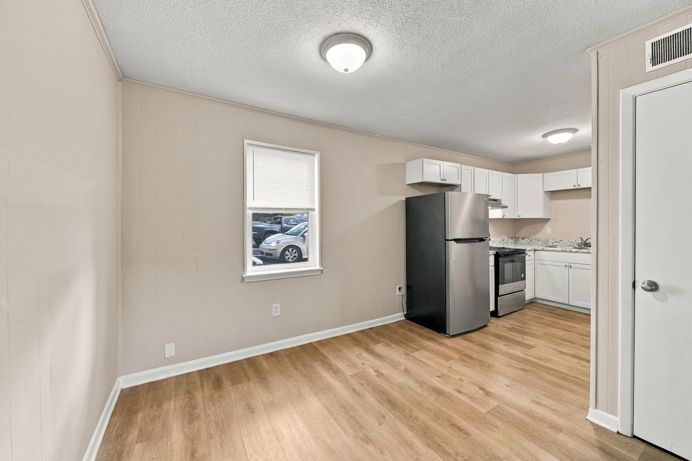 Dining area and kitchen, as photographed